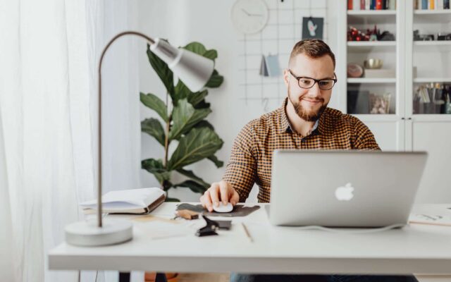man using macbook